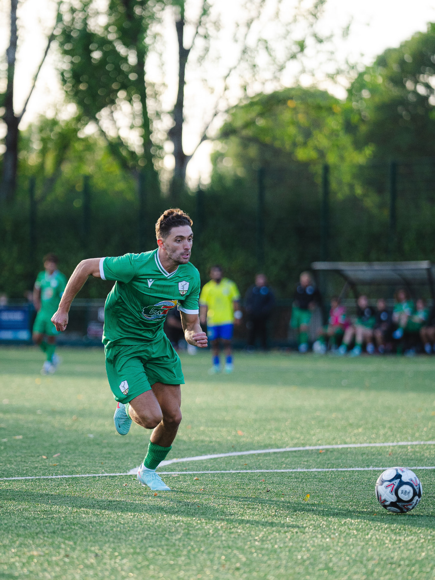 A Forest Row player running in an evening match