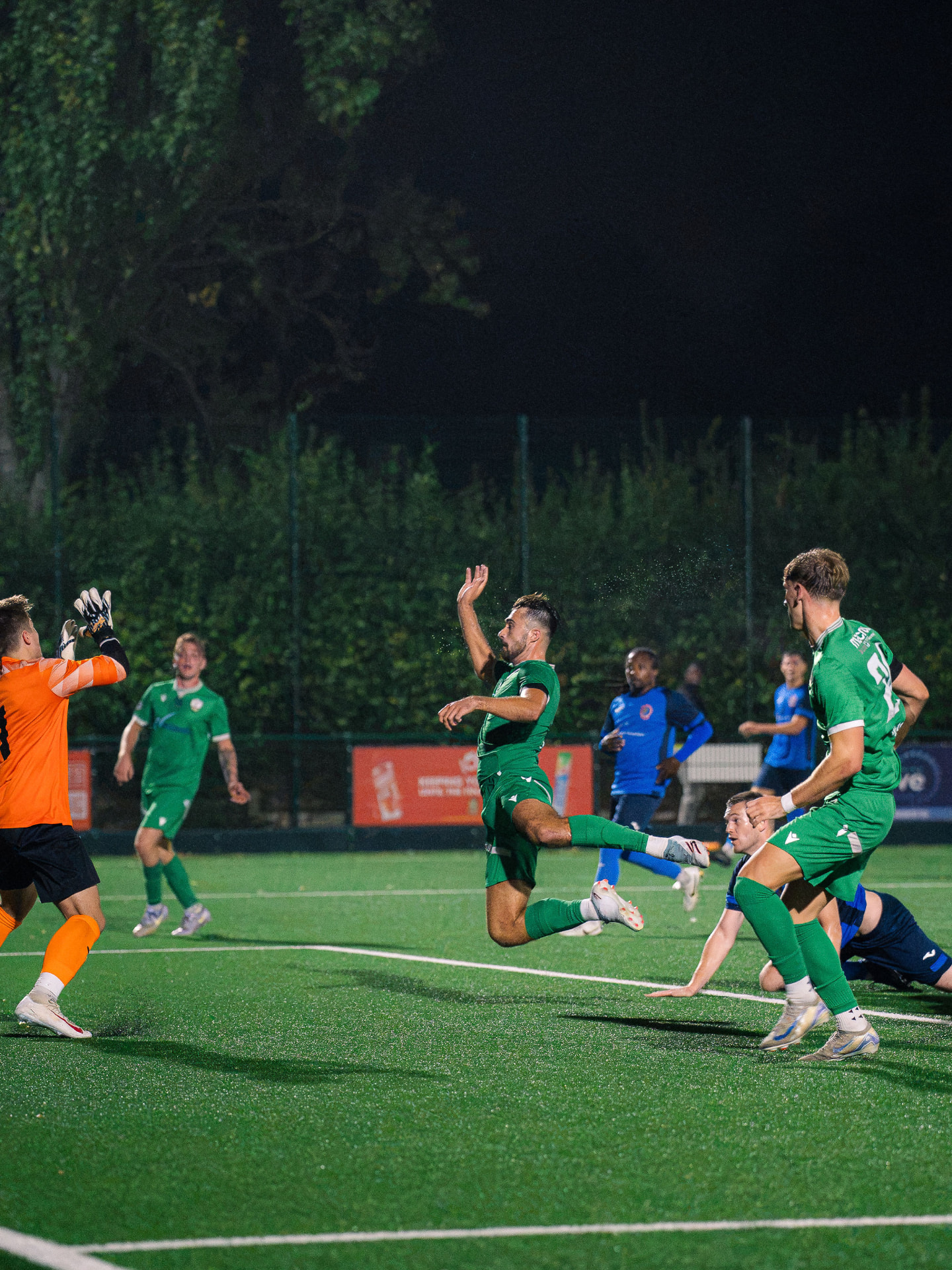 Forest Row FC player in the green home kit
