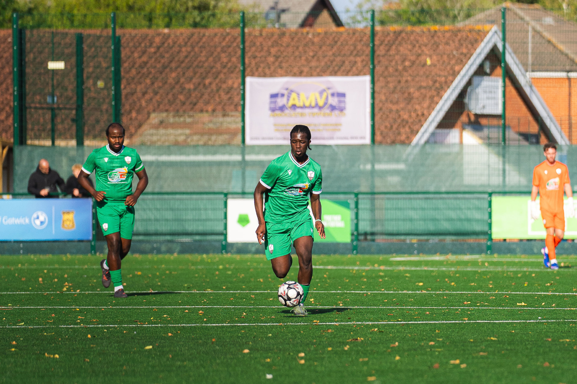 Forest Row FC players in action in their green home kit